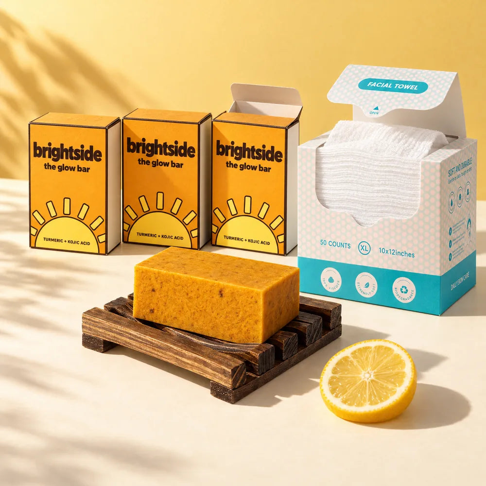 Three boxed Glow Bars with the wooden bar dish and a box of facial towels