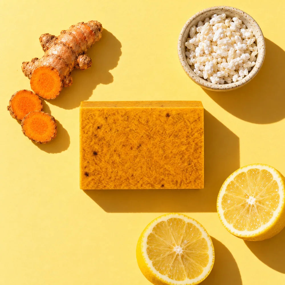 The Glow Bar with turmeric root, koji rice and a halved lemon
